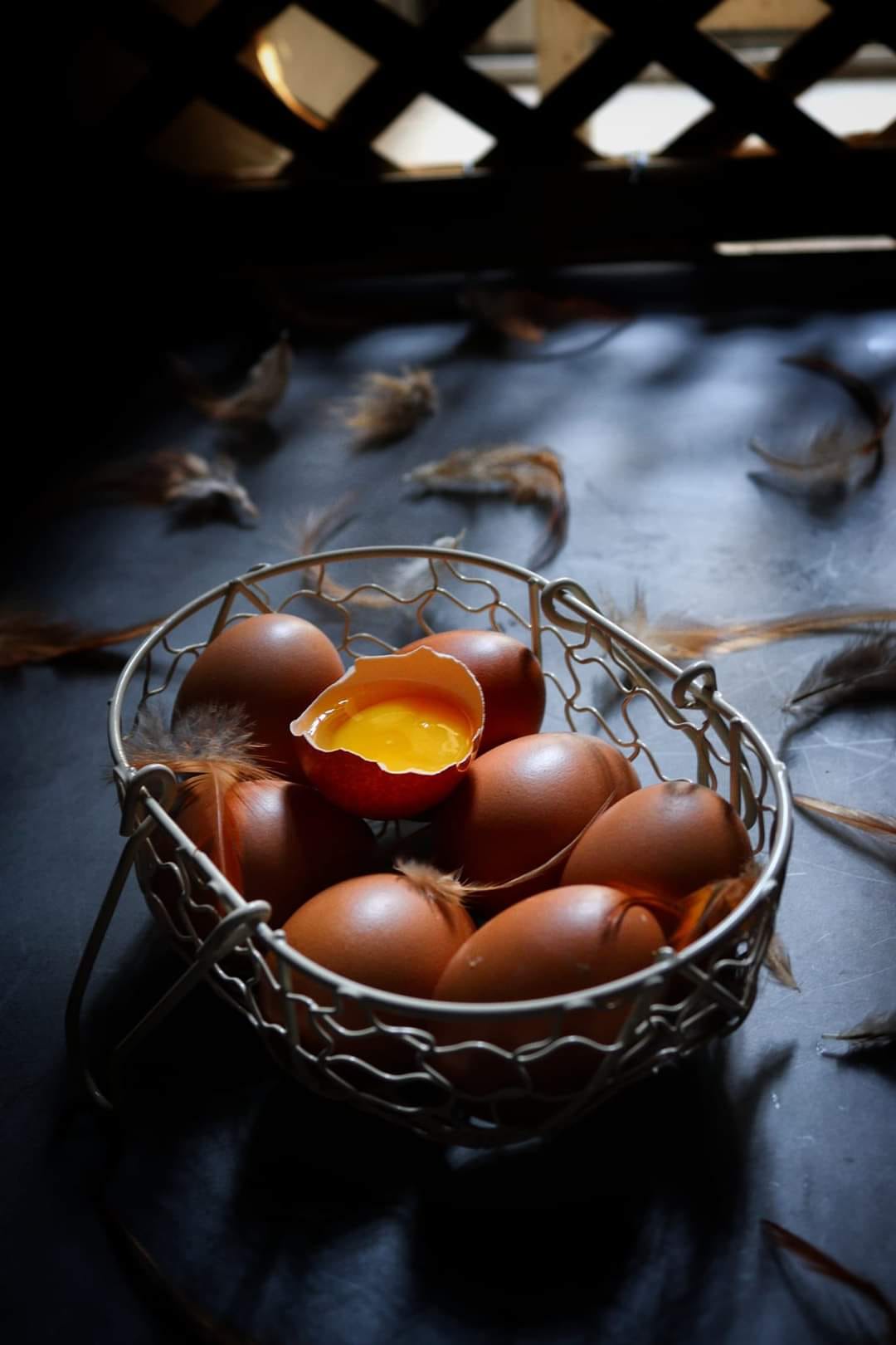 A broken egg in a bowl